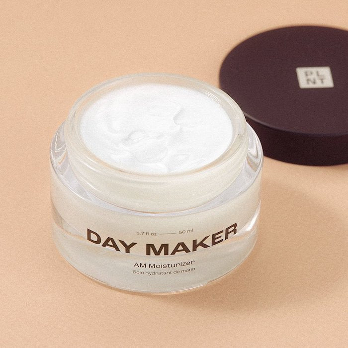 plant apothecary day maker daily face cream open jar with lid next to it