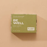 A green box of bar soap that says “Be well”, “Cypress and Eucalyptus” by Plant apothecary