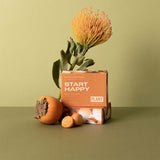 An orange box of bar soap that says “Start Happy”, “Citrus and Frankincense” by Plant apothecary