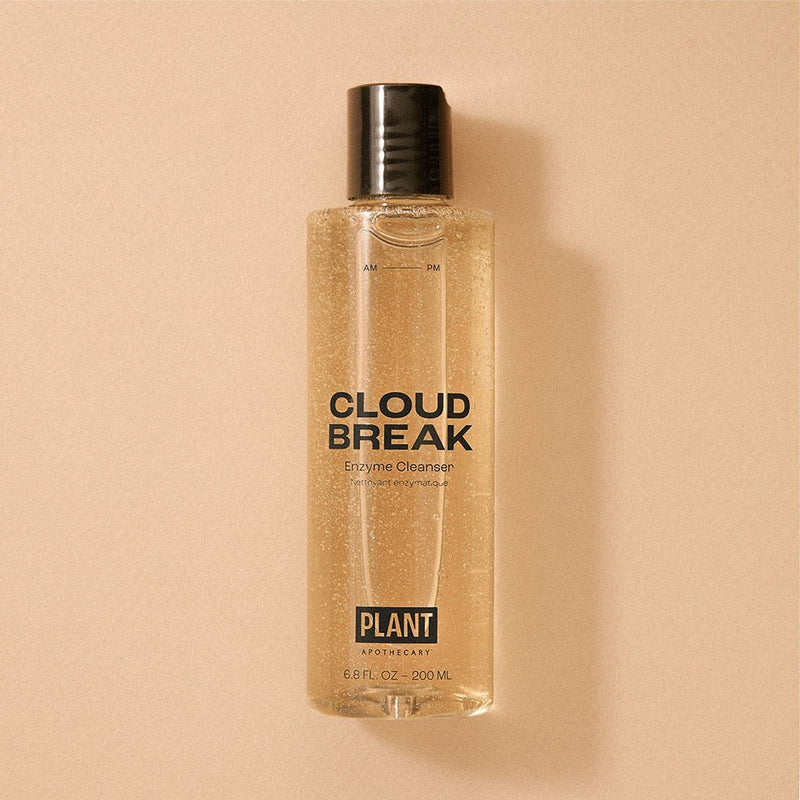 one clear bottle of plant apothecary cloud break enzyme cleanser with black top on plain background